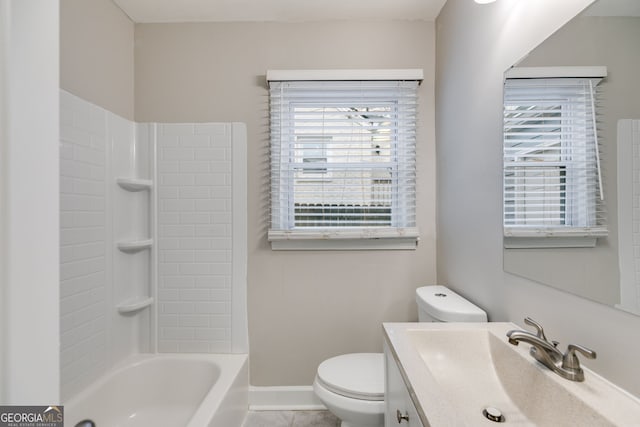 1318 Beecher St SW, Atlanta, GA 30310 - full bathroom featuring toilet, vanity, shower / bath combination, baseboards, and tile patterned flooring