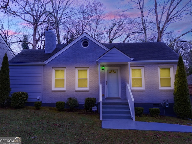 1318 Beecher St SW, Atlanta, GA 30310 - view of front of property with brick siding, a chimney, and a shingled roof