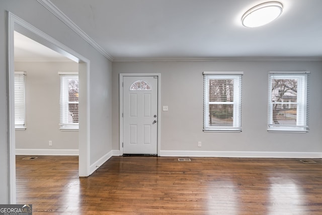 1318 Beecher St SW, Atlanta, GA 30310 - entryway with wood finished floors, crown molding, and baseboards