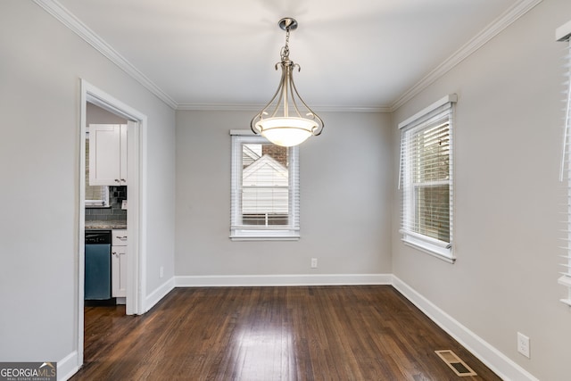 1318 Beecher St SW, Atlanta, GA 30310 - unfurnished dining area with plenty of natural light, dark wood-style floors, baseboards, and crown molding