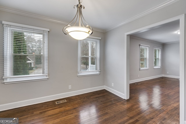 1318 Beecher St SW, Atlanta, GA 30310 - spare room featuring wood finished floors, baseboards, and crown molding