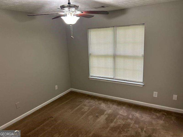 5755 Belmont Ridge Cir, Lithonia, GA 30038 - unfurnished room featuring a ceiling fan, a textured ceiling, and carpet flooring