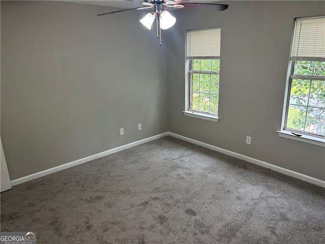 5755 Belmont Ridge Cir, Lithonia, GA 30038 - carpeted spare room with ceiling fan and plenty of natural light