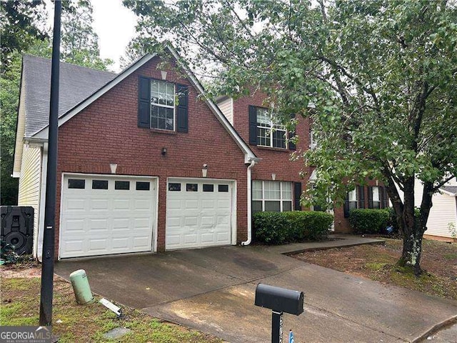 5755 Belmont Ridge Cir, Lithonia, GA 30038 - traditional-style home with concrete driveway and brick siding