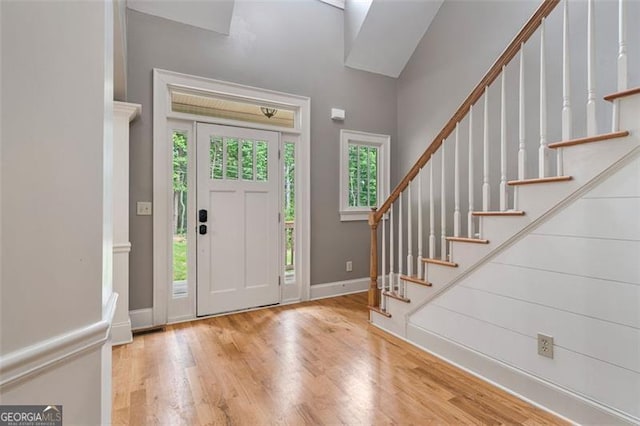 109 Sitting Bull Ct, Waleska, GA 30183 - foyer with wood finished floors, stairs, and baseboards