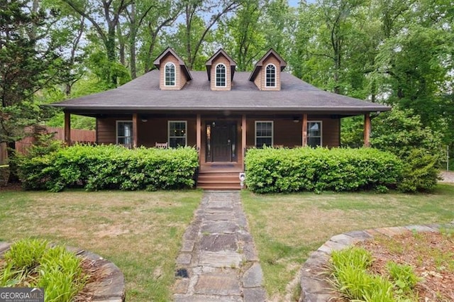 68 Edwin Pl, Atlanta, GA 30318 - view of front of house featuring a porch and a front lawn
