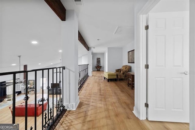 68 Edwin Pl, Atlanta, GA 30318 - hall featuring light wood-type flooring, beamed ceiling, and recessed lighting