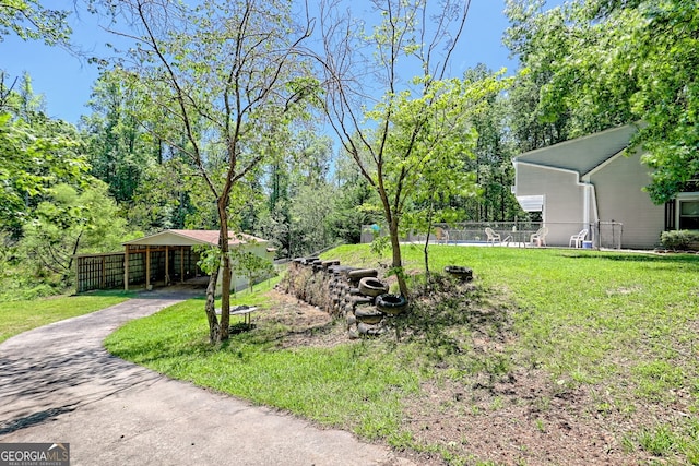 218 Jefferson Pl, Toccoa, GA 30577 - view of yard with asphalt driveway and a detached carport