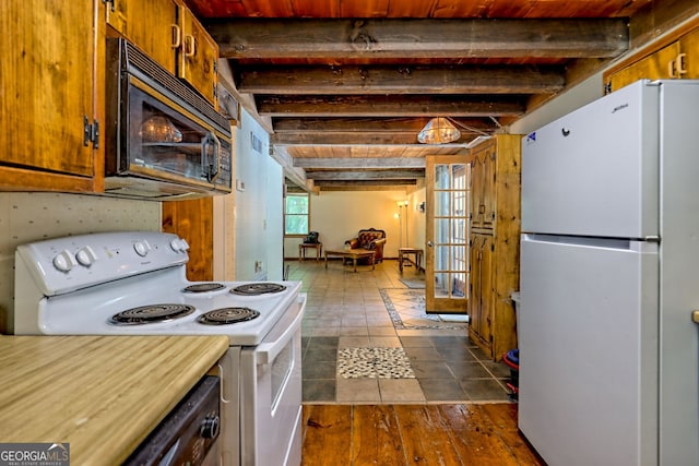 218 Jefferson Pl, Toccoa, GA 30577 - kitchen with white appliances, dark tile patterned flooring, beam ceiling, and light countertops