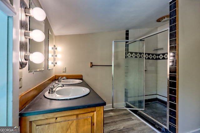 218 Jefferson Pl, Toccoa, GA 30577 - bathroom with a shower stall, wood finished floors, and double vanity