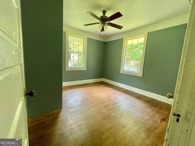 14 J Ave, Gainesville, GA 30504 - empty room featuring hardwood / wood-style floors, baseboards, and ceiling fan