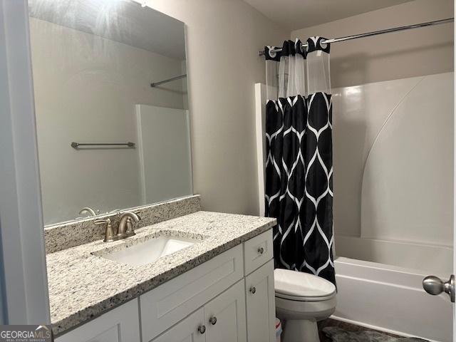340 Mcgiboney Ln, Covington, GA 30016 - full bathroom featuring vanity and shower / bath combo