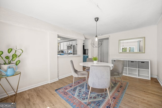 2826 Ben Hill Rd, East Point, GA 30344 - dining area with light wood-type flooring and baseboards