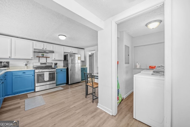 2826 Ben Hill Rd, East Point, GA 30344 - kitchen featuring appliances with stainless steel finishes, washer / clothes dryer, blue cabinetry, under cabinet range hood, and electric panel