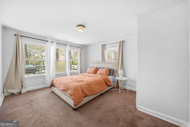 2826 Ben Hill Rd, East Point, GA 30344 - carpeted bedroom featuring baseboards and ornamental molding