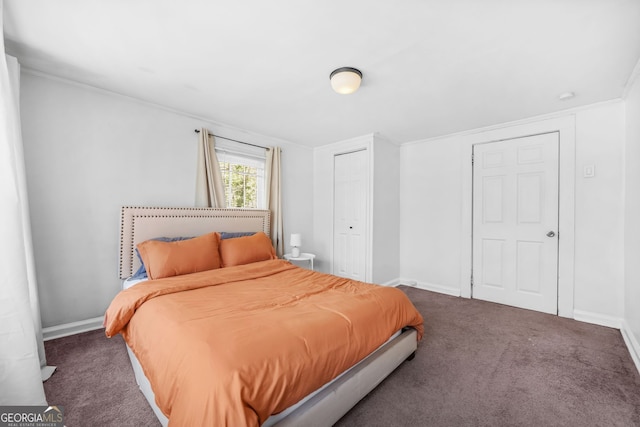2826 Ben Hill Rd, East Point, GA 30344 - carpeted bedroom with baseboards and a closet
