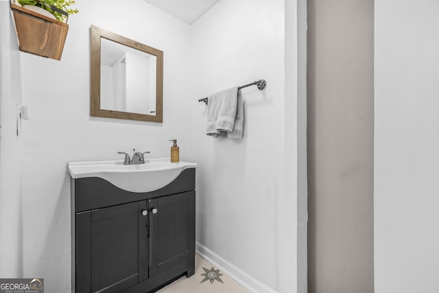 2826 Ben Hill Rd, East Point, GA 30344 - bathroom with vanity and baseboards