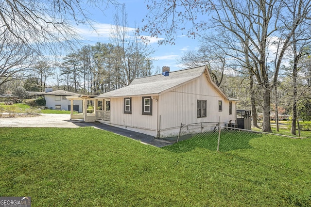 2826 Ben Hill Rd, East Point, GA 30344 - view of side of property with a chimney and roof with shingles