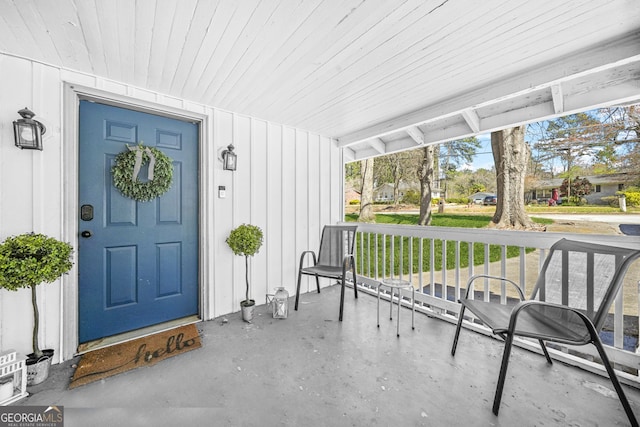 2826 Ben Hill Rd, East Point, GA 30344 - doorway to property featuring a porch and board and batten siding
