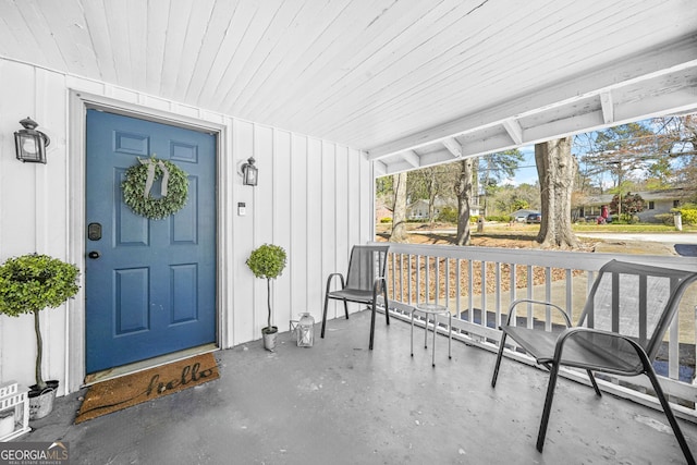 2826 Ben Hill Rd, East Point, GA 30344 - property entrance featuring a porch and board and batten siding