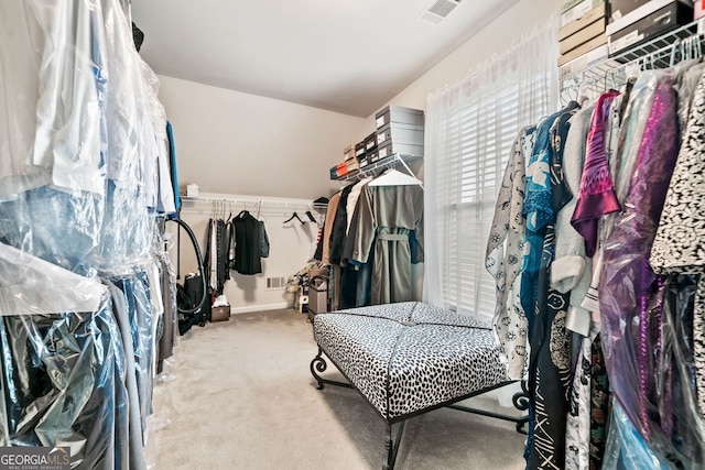 1898 Alcovy Shoals Blf SE, Lawrenceville, GA 30045 - walk in closet featuring carpet