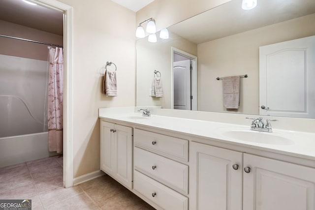 1898 Alcovy Shoals Blf SE, Lawrenceville, GA 30045 - bathroom with double vanity, tile patterned floors, and shower / tub combo with curtain
