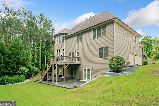 1898 Alcovy Shoals Blf SE, Lawrenceville, GA 30045 - back of house featuring stairway, an attached garage, a wooden deck, and a yard