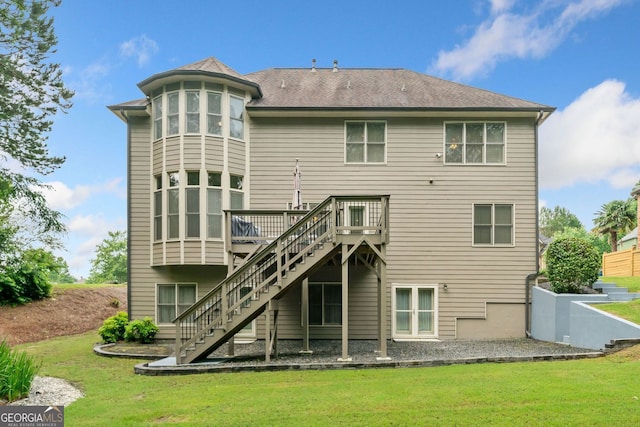 1898 Alcovy Shoals Blf SE, Lawrenceville, GA 30045 - back of property with a deck, stairs, and a lawn