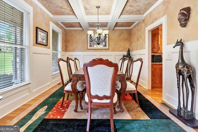 1898 Alcovy Shoals Blf SE, Lawrenceville, GA 30045 - dining area featuring a chandelier, wood finished floors, coffered ceiling, beamed ceiling, and a decorative wall
