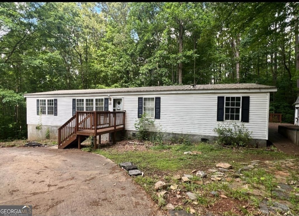 278 Kerdzen Way, Maysville, GA 30558 - manufactured / mobile home with a wooden deck and crawl space