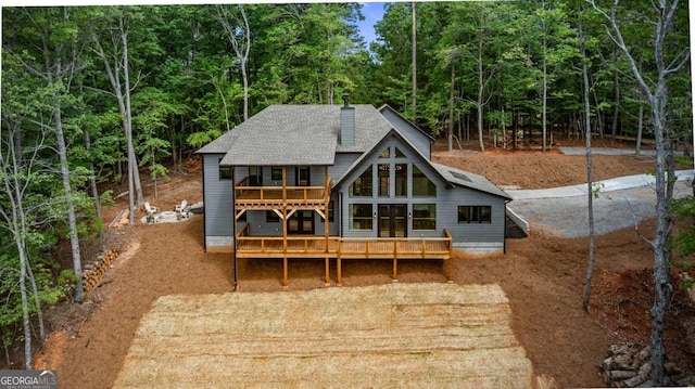 458 Palisade Dr Unit 2142, Ellijay, GA 30540 - back of property with a wooden deck, a chimney, and a wooded view