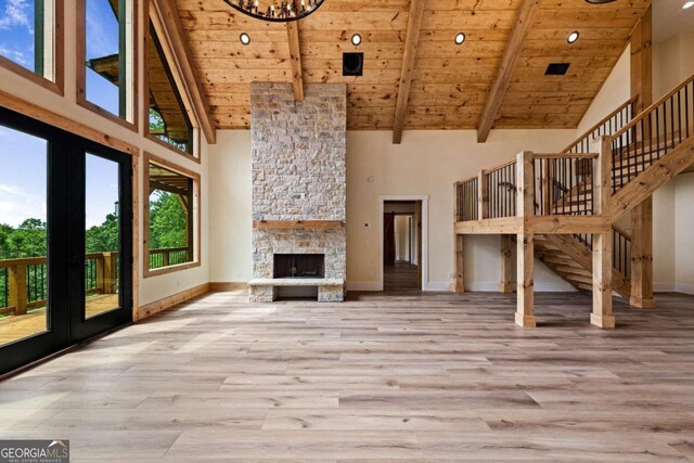 458 Palisade Dr Unit 2142, Ellijay, GA 30540 - unfurnished living room with high vaulted ceiling, wood ceiling with exposed beams, stairs, baseboards, and wood finished floors