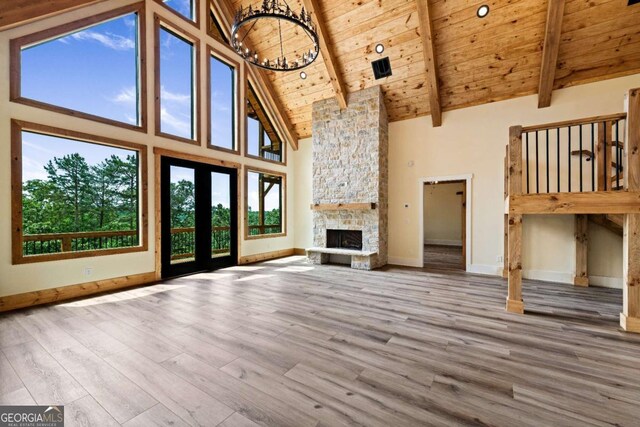 458 Palisade Dr Unit 2142, Ellijay, GA 30540 - unfurnished living room with wood ceiling with exposed beams, high vaulted ceiling, healthy amount of natural light, wood finished floors, and baseboards