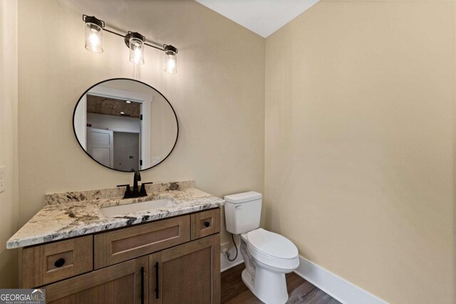 458 Palisade Dr Unit 2142, Ellijay, GA 30540 - bathroom featuring wood finished floors, vanity, toilet, and baseboards