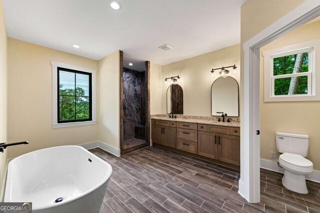 458 Palisade Dr Unit 2142, Ellijay, GA 30540 - full bath featuring a soaking tub, double vanity, a shower stall, baseboards, and toilet