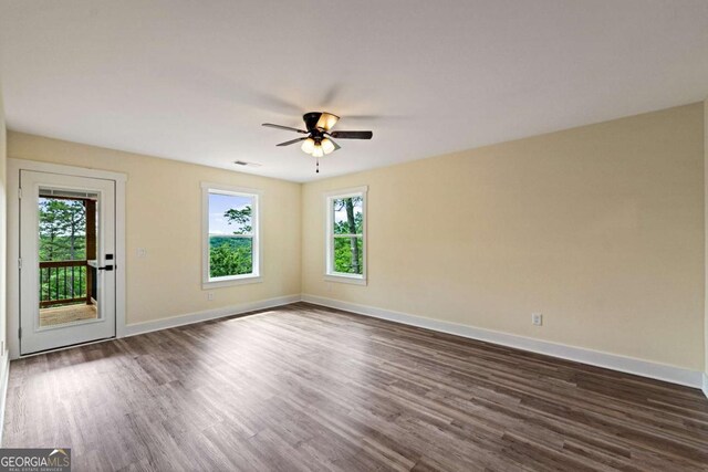 458 Palisade Dr Unit 2142, Ellijay, GA 30540 - spare room with plenty of natural light, dark wood-style floors, a ceiling fan, and baseboards
