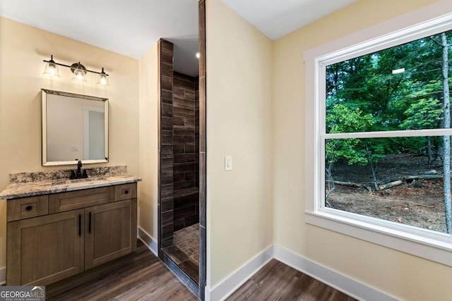 458 Palisade Dr Unit 2142, Ellijay, GA 30540 - bathroom with vanity, wood finished floors, a tile shower, and baseboards