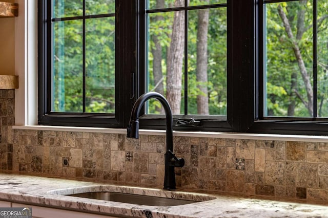 458 Palisade Dr Unit 2142, Ellijay, GA 30540 - kitchen view of a sink, backsplash, and light stone counters
