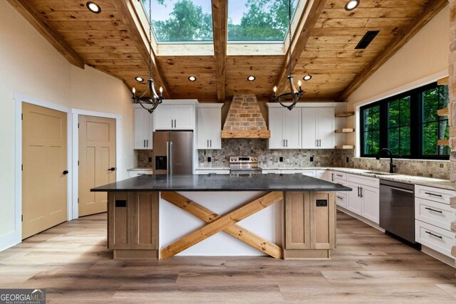 458 Palisade Dr Unit 2142, Ellijay, GA 30540 - kitchen with appliances with stainless steel finishes, wall chimney exhaust hood, wood ceiling, a kitchen island, and open shelves