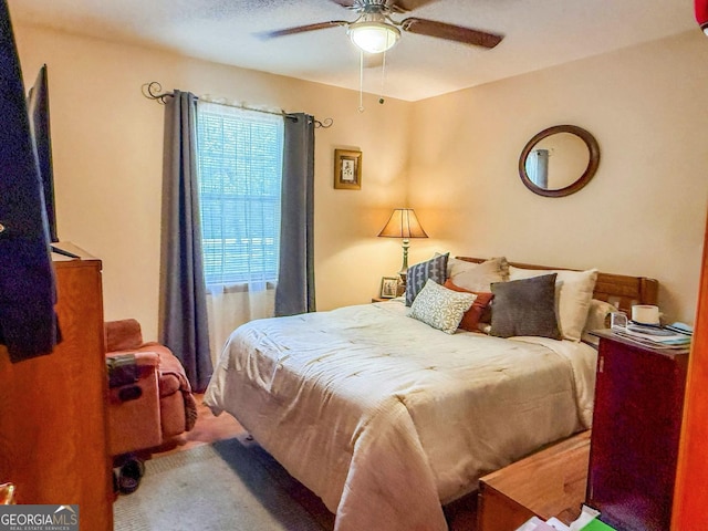 147 Glen Oaks Rd, Perry, GA 31069 - carpeted bedroom with a ceiling fan