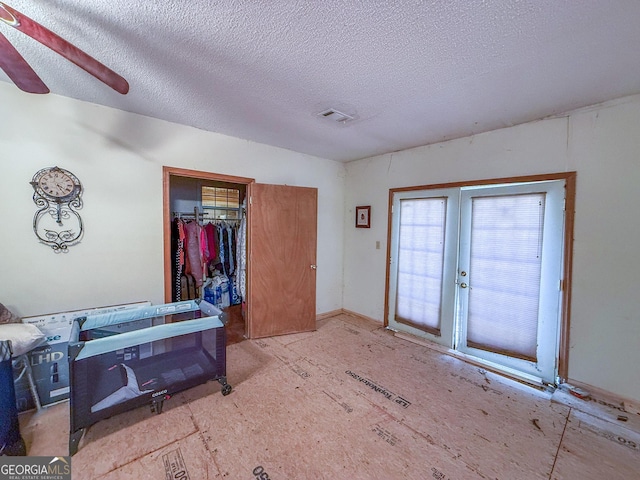 147 Glen Oaks Rd, Perry, GA 31069 - foyer with a textured ceiling and french doors