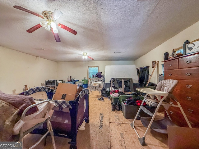147 Glen Oaks Rd, Perry, GA 31069 - misc room with a ceiling fan and a textured ceiling