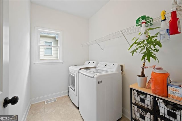 4108 Wyndam Hill Dr, Suwanee, GA 30024 - laundry room with washer and dryer and baseboards