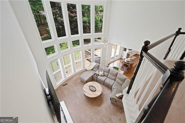 4108 Wyndam Hill Dr, Suwanee, GA 30024 - living room with a towering ceiling and ceiling fan