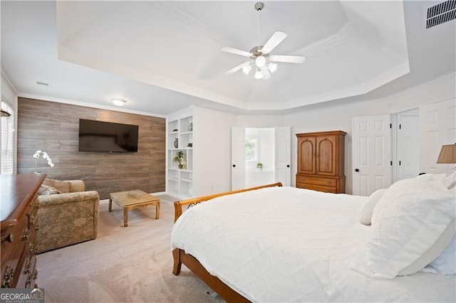 4108 Wyndam Hill Dr, Suwanee, GA 30024 - bedroom with a raised ceiling, wooden walls, light colored carpet, ceiling fan, and ornamental molding