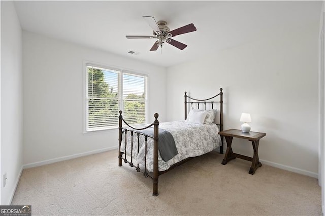 4108 Wyndam Hill Dr, Suwanee, GA 30024 - bedroom featuring light carpet and a ceiling fan