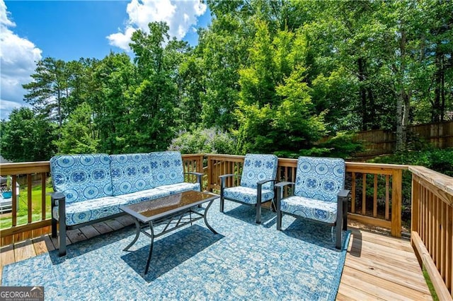 4108 Wyndam Hill Dr, Suwanee, GA 30024 - wooden terrace with outdoor lounge area and view of wooded area
