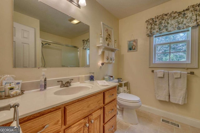 2008 Hidden Valley Rd, Hiawassee, GA 30546 - bathroom with vanity, tile patterned flooring, and an enclosed shower