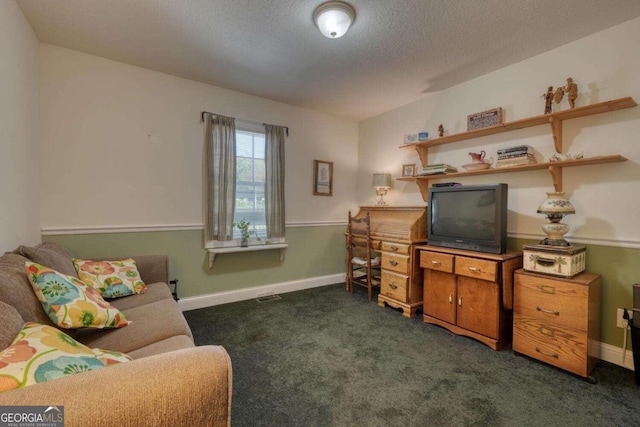 2008 Hidden Valley Rd, Hiawassee, GA 30546 - living area featuring dark colored carpet, baseboards, and a textured ceiling