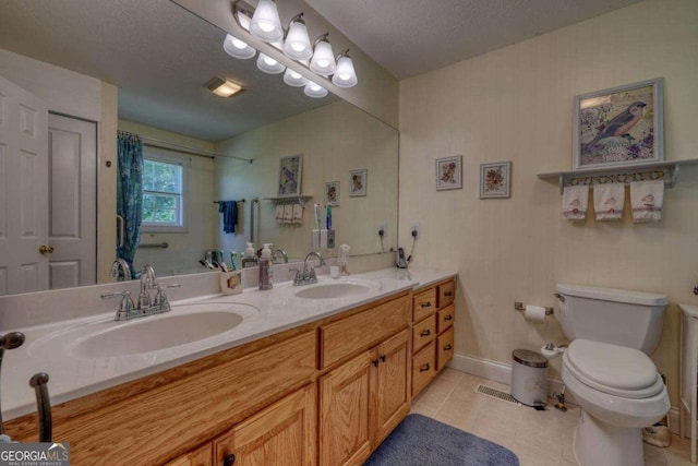 2008 Hidden Valley Rd, Hiawassee, GA 30546 - full bathroom featuring double vanity, tile patterned floors, and a shower with curtain
